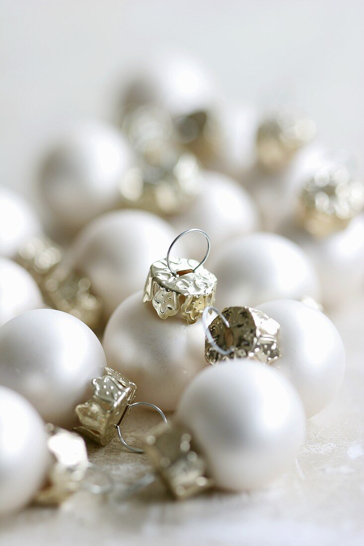 Small, white Christmas baubles