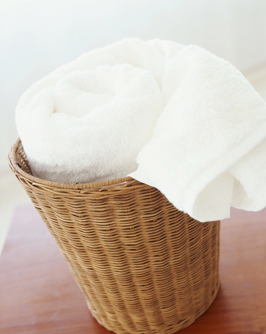 Rolled towel in basket
