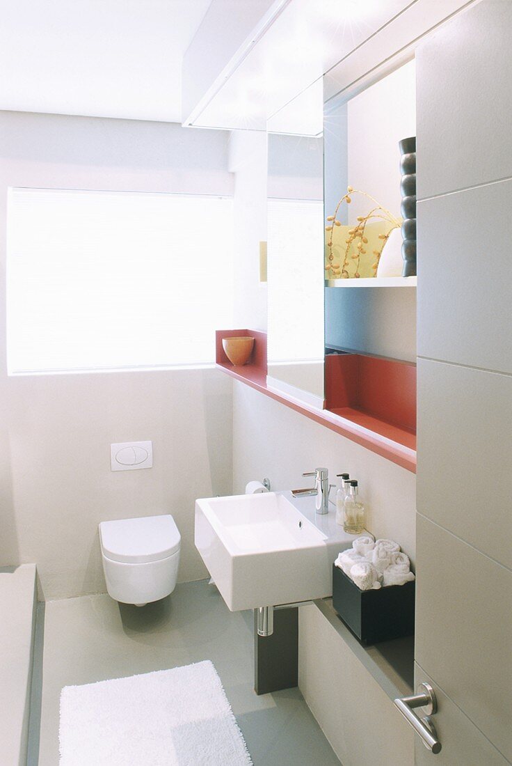 Toilet and wash basin in a bathroom