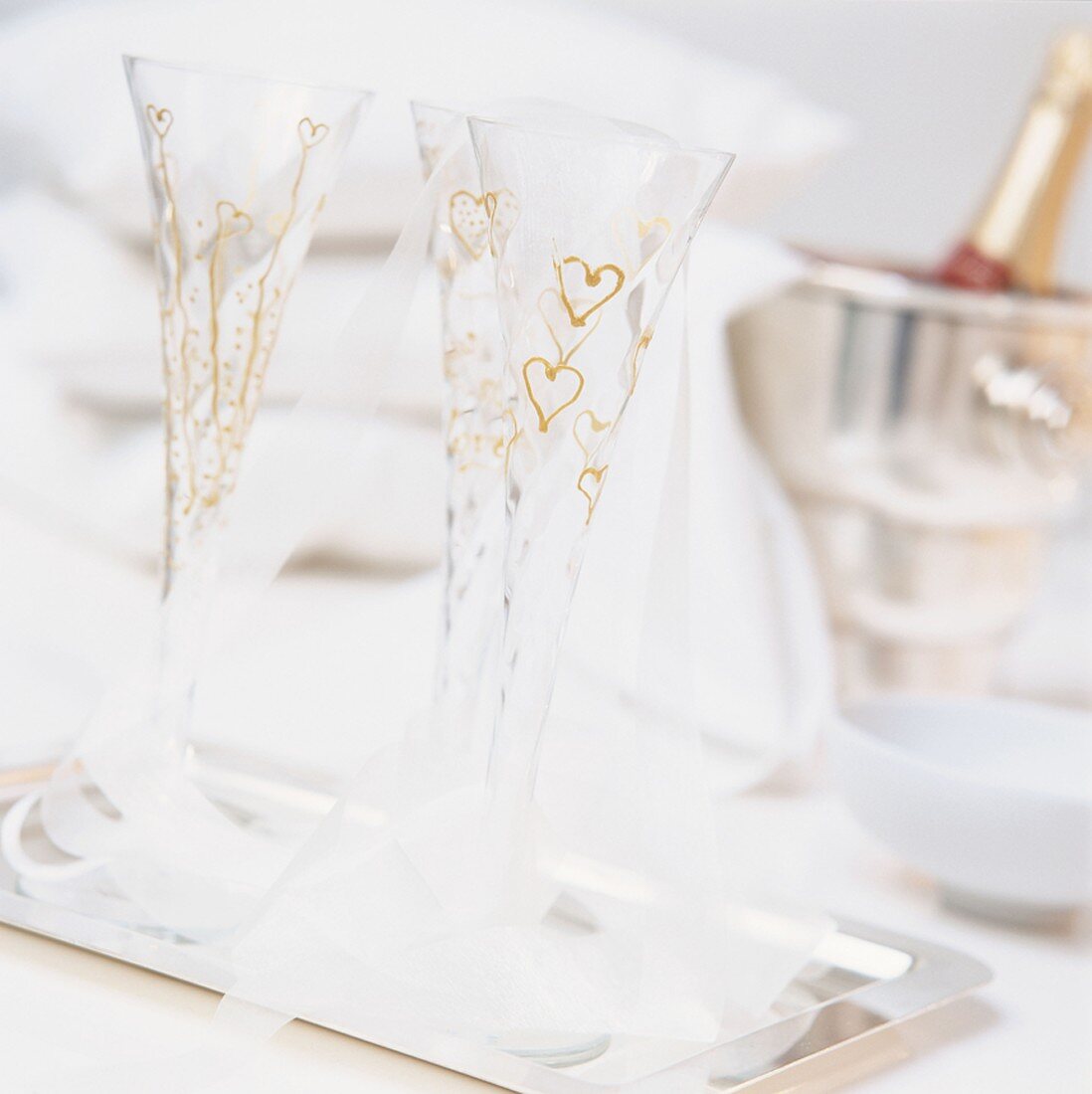 Champagne glasses with painted hearts