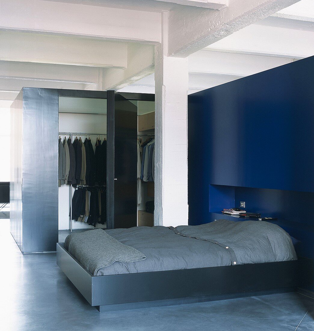 Bed and wardrobe in loft bedroom