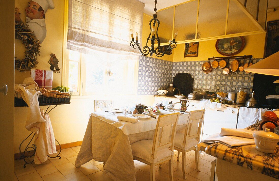A kitchen with a dining table