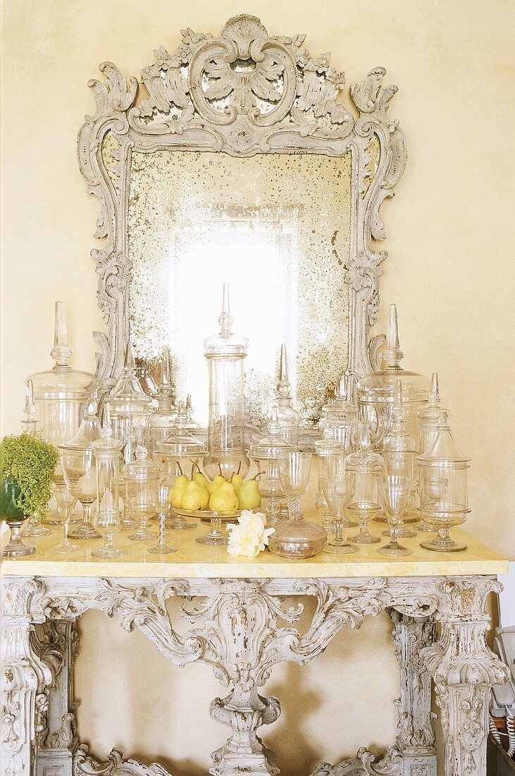 An opulent wall table with glasses
