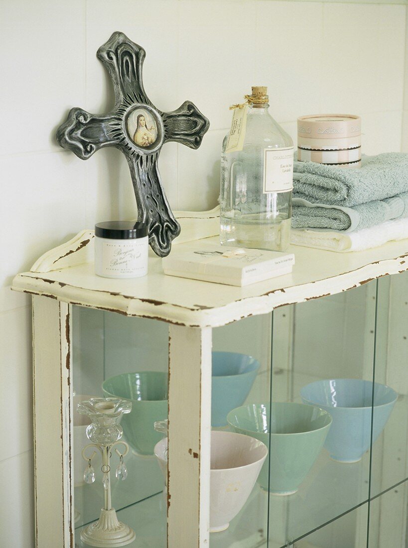 Dishes in display cabinet