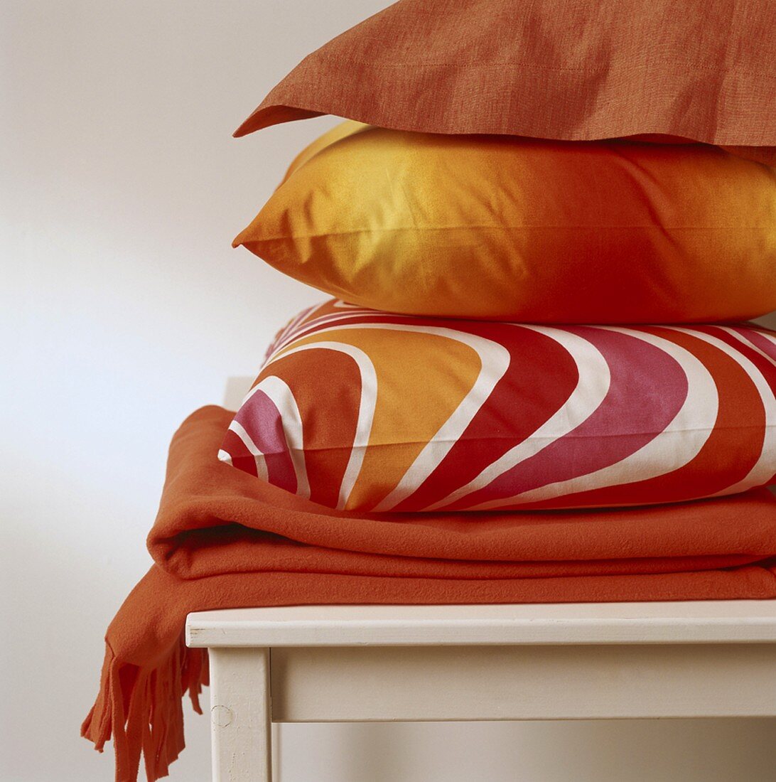 A stack of three cushions