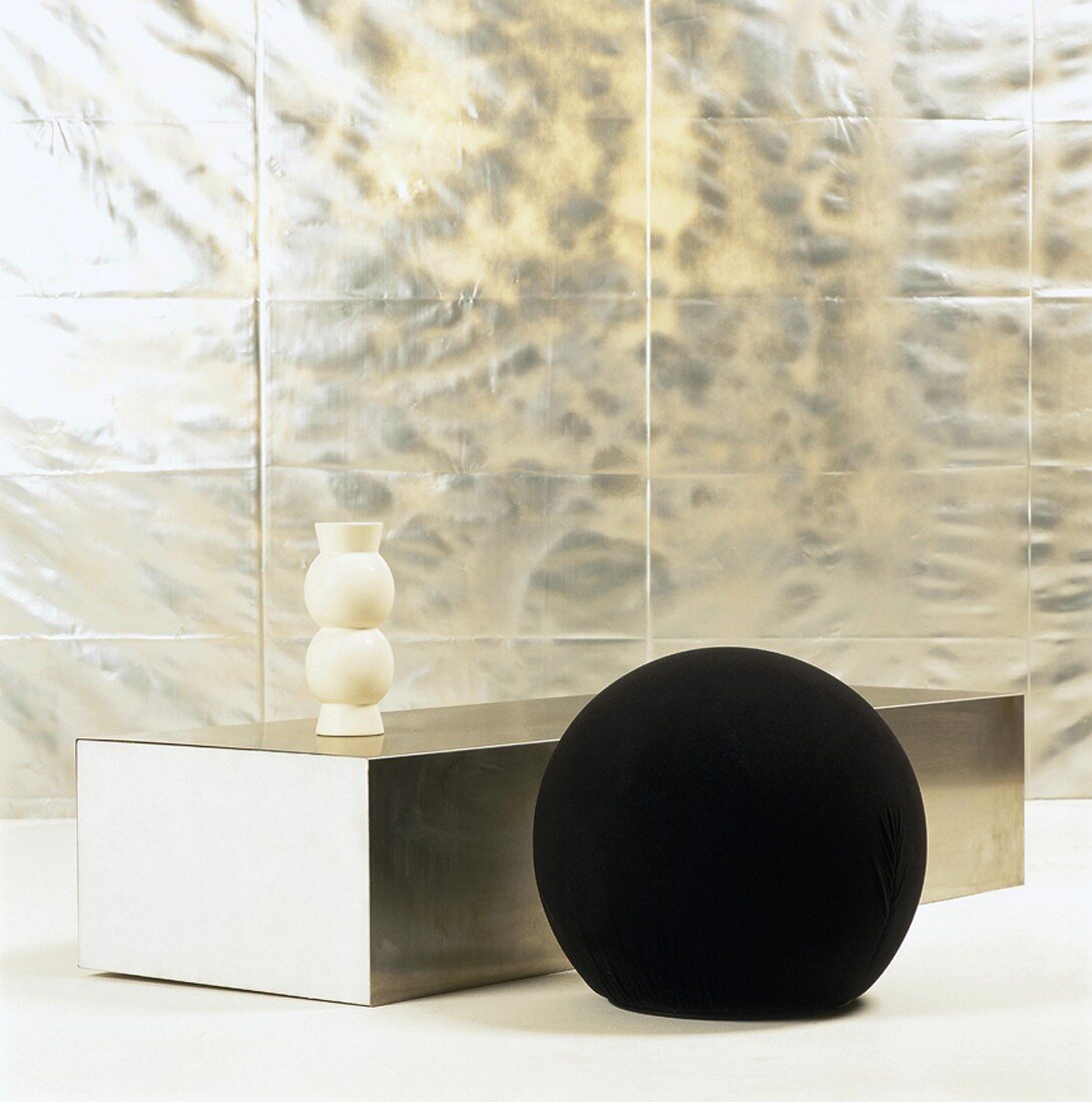 Spherical pouffe and low coffee table