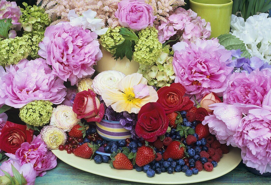 Assorted flowers, blossom and fresh berries