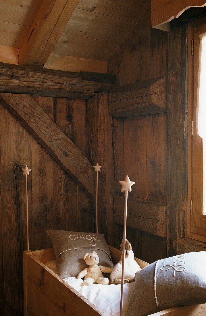 A corner of a room in a wooden house