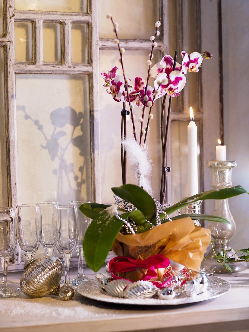 Christmas table decoration with an orchid