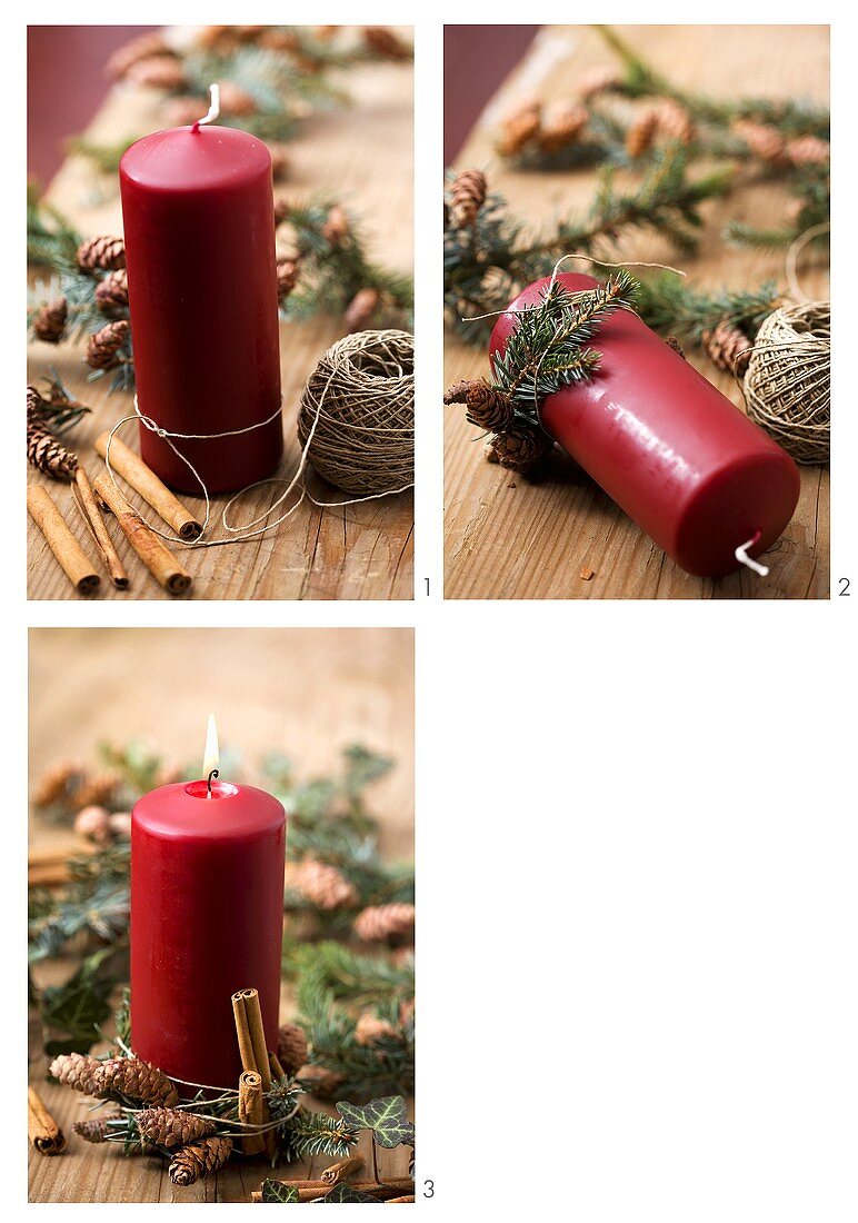 Decorating a candle with ivy, fir sprigs and cinnamon sticks
