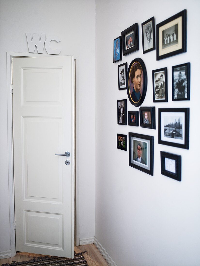 Photos on wall and toilet door