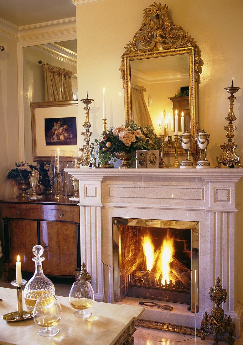 Fireplace with burning fire in a living room