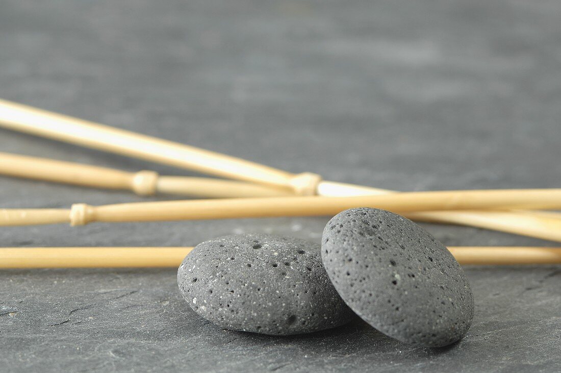 Grey pebbles and reeds