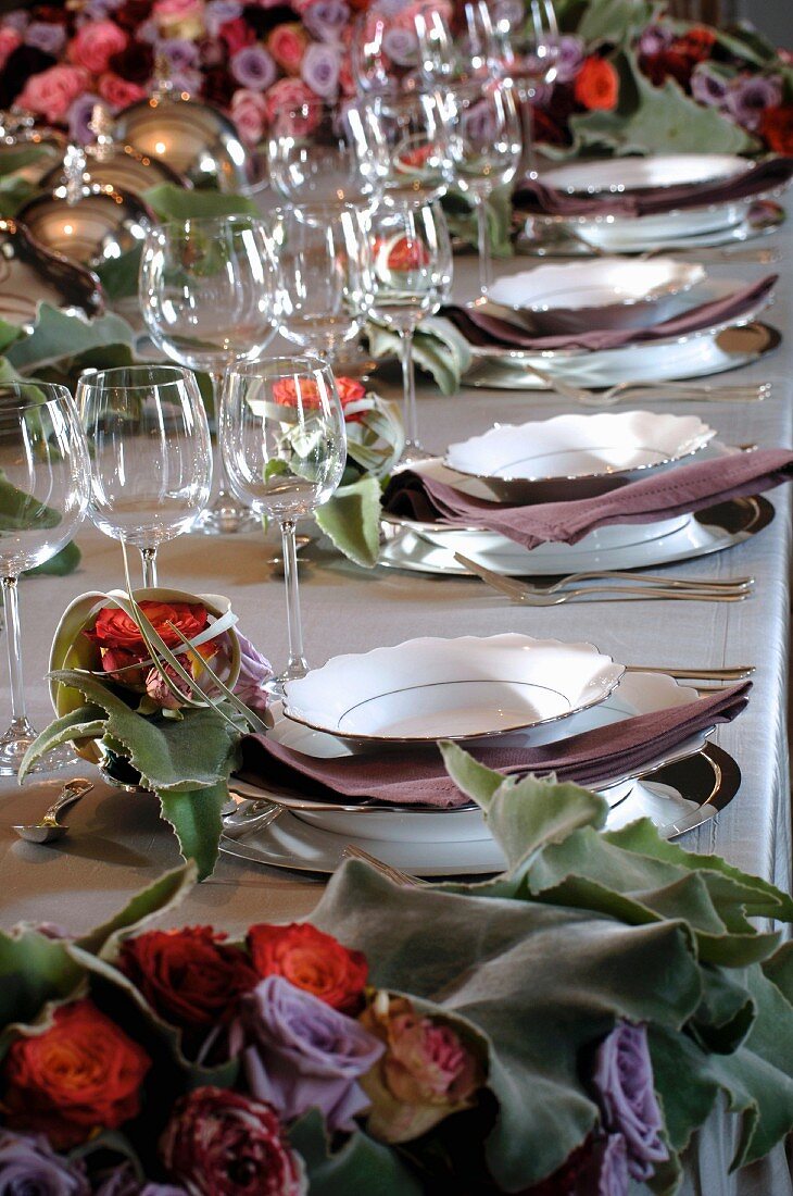 A festively decorated trestle table with flowers