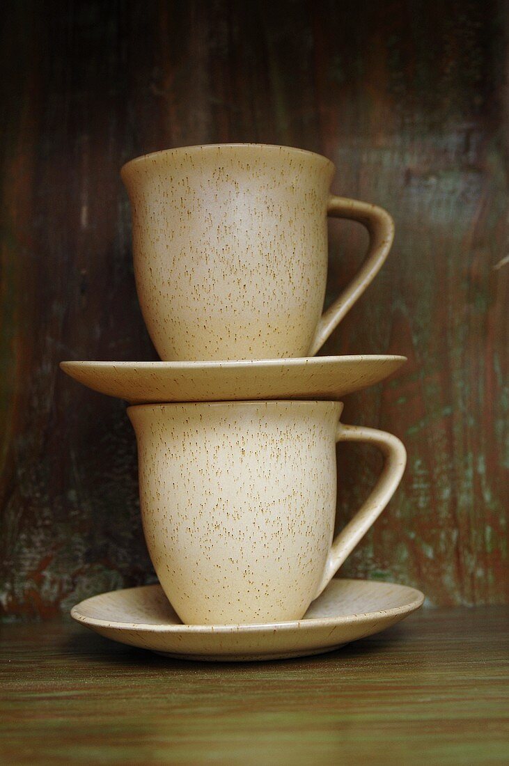 Two cups and saucers, stacked