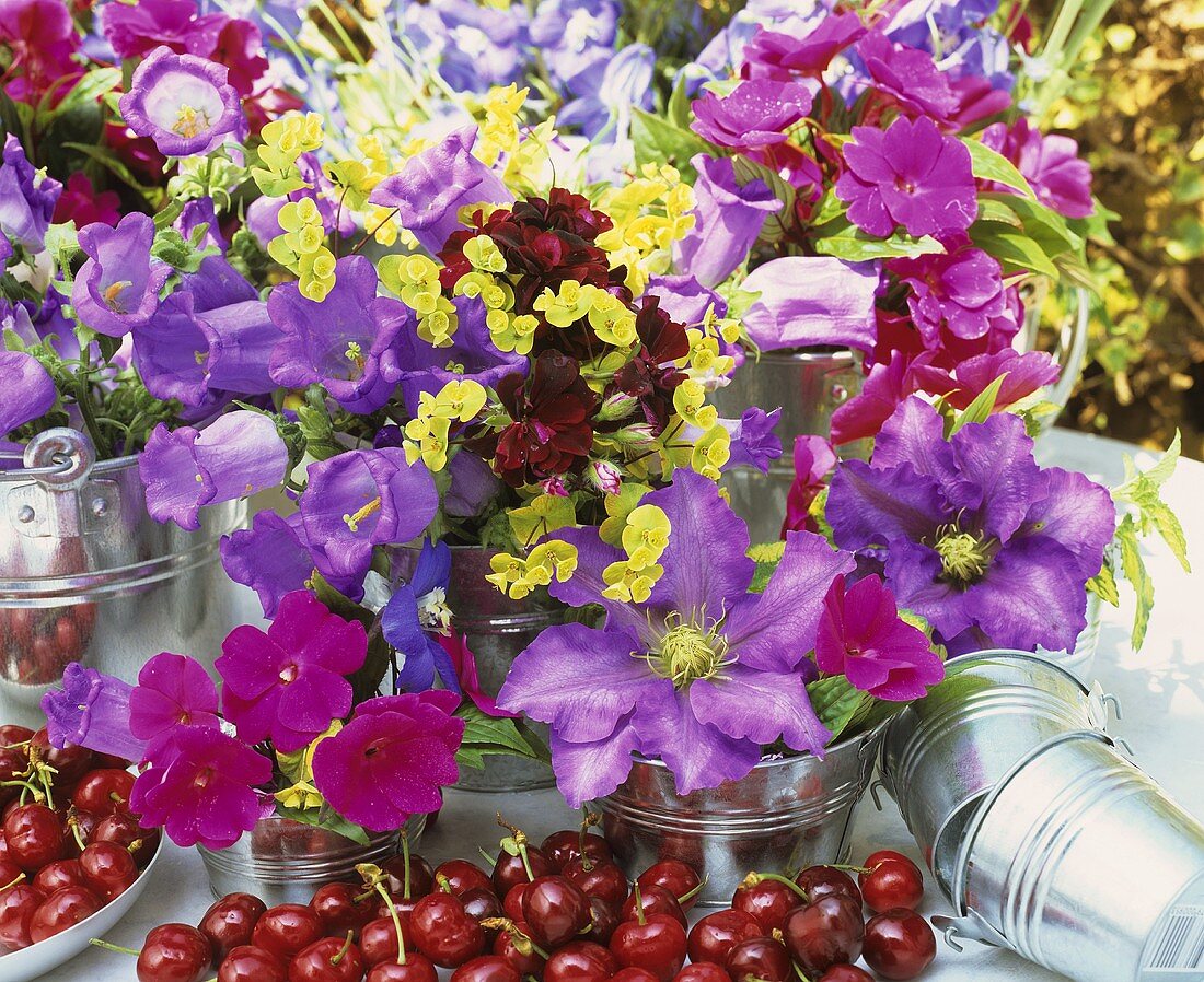 Cherries & summer flowers (clematis etc.) in small buckets