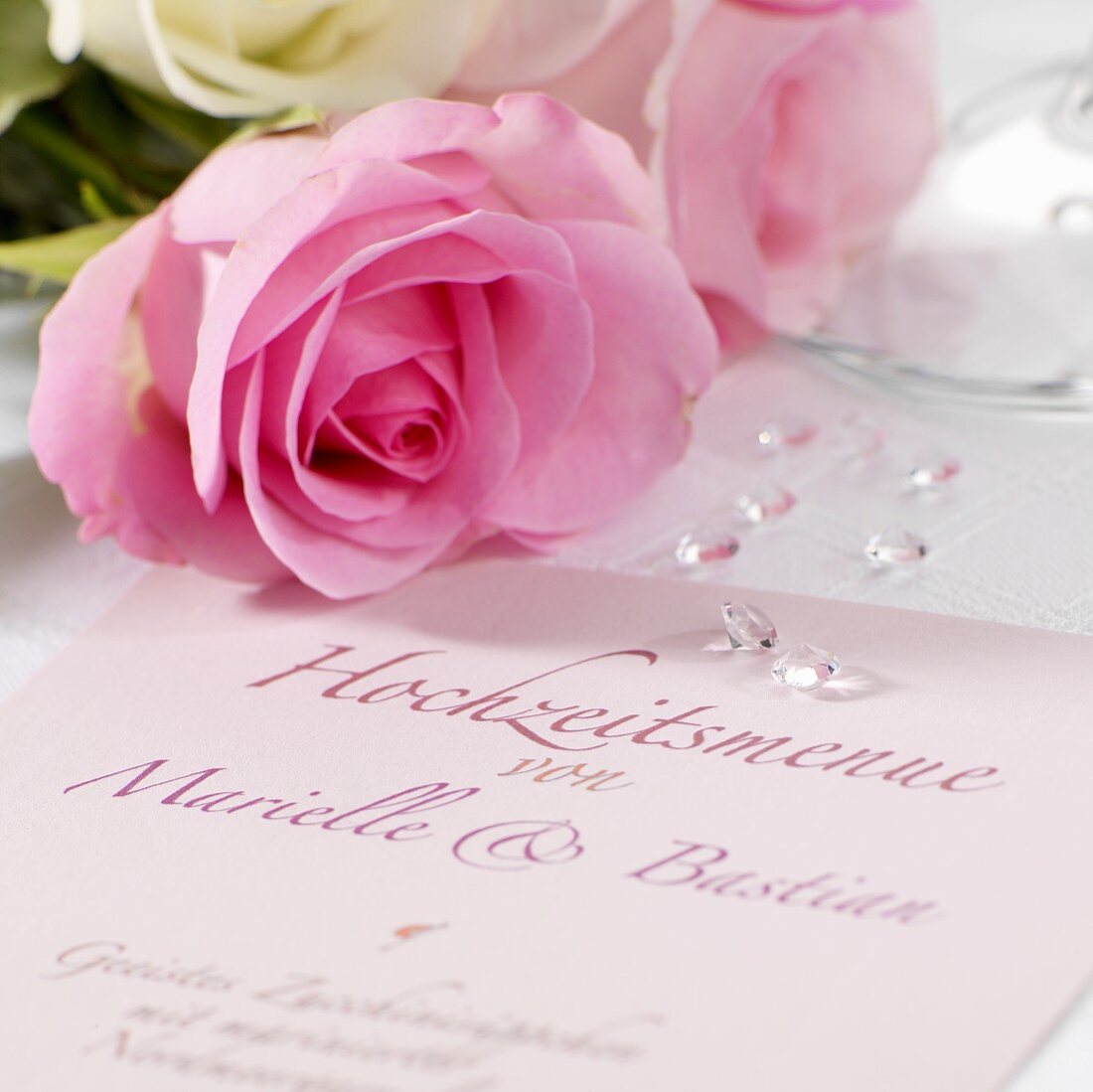 Wedding menu and roses