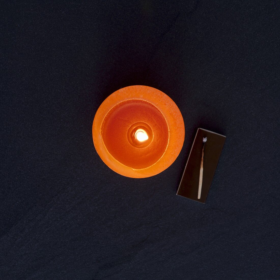 Orange candle (overhead view)
