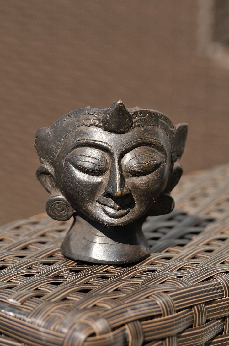 Bronzekopf aus Birma als Aschenbecher