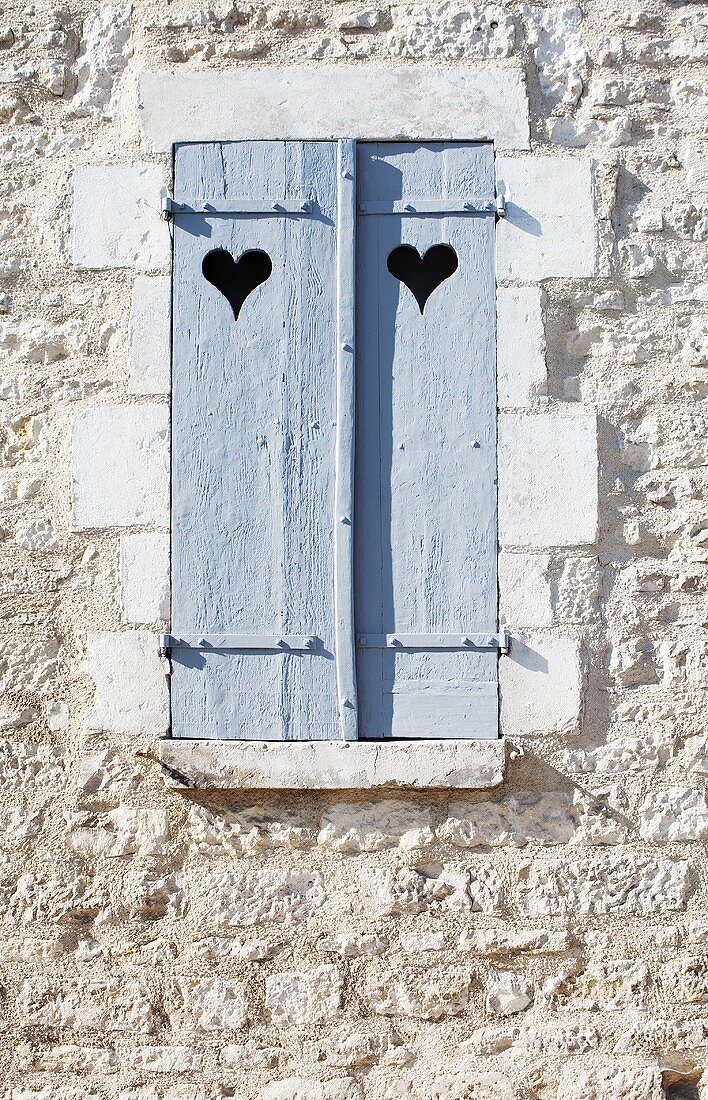 Wooden Shutters with Hearts Cut Out; French Countryside