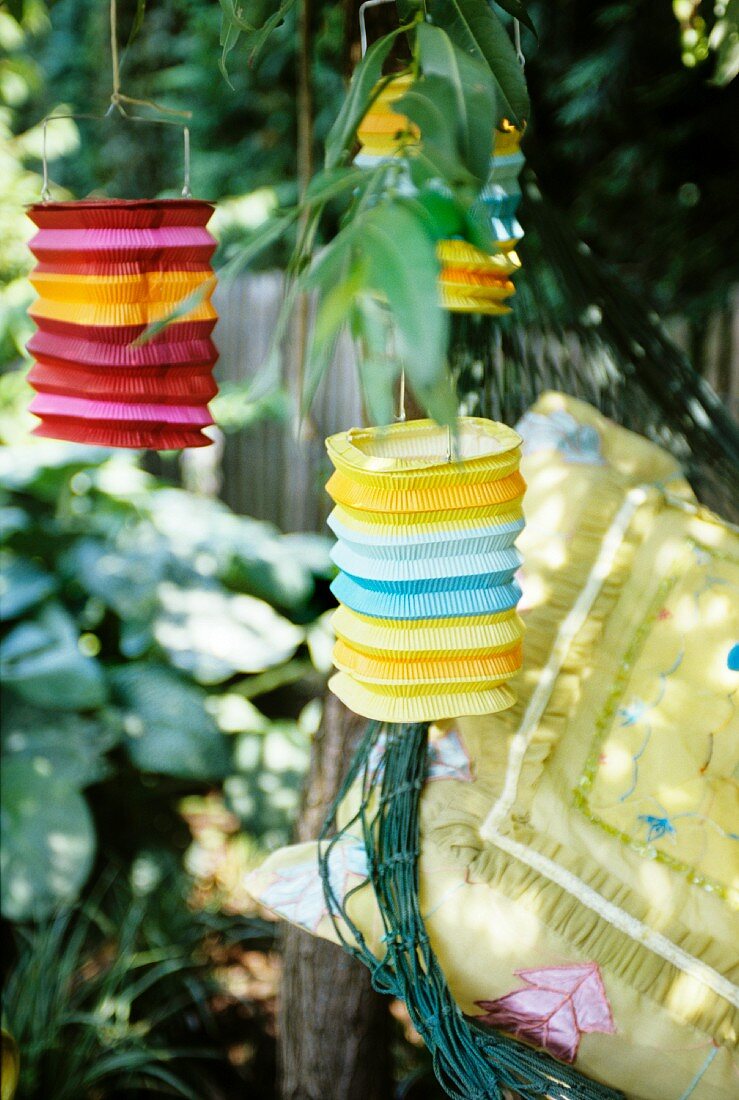 Colourful lanterns hanging in a tree