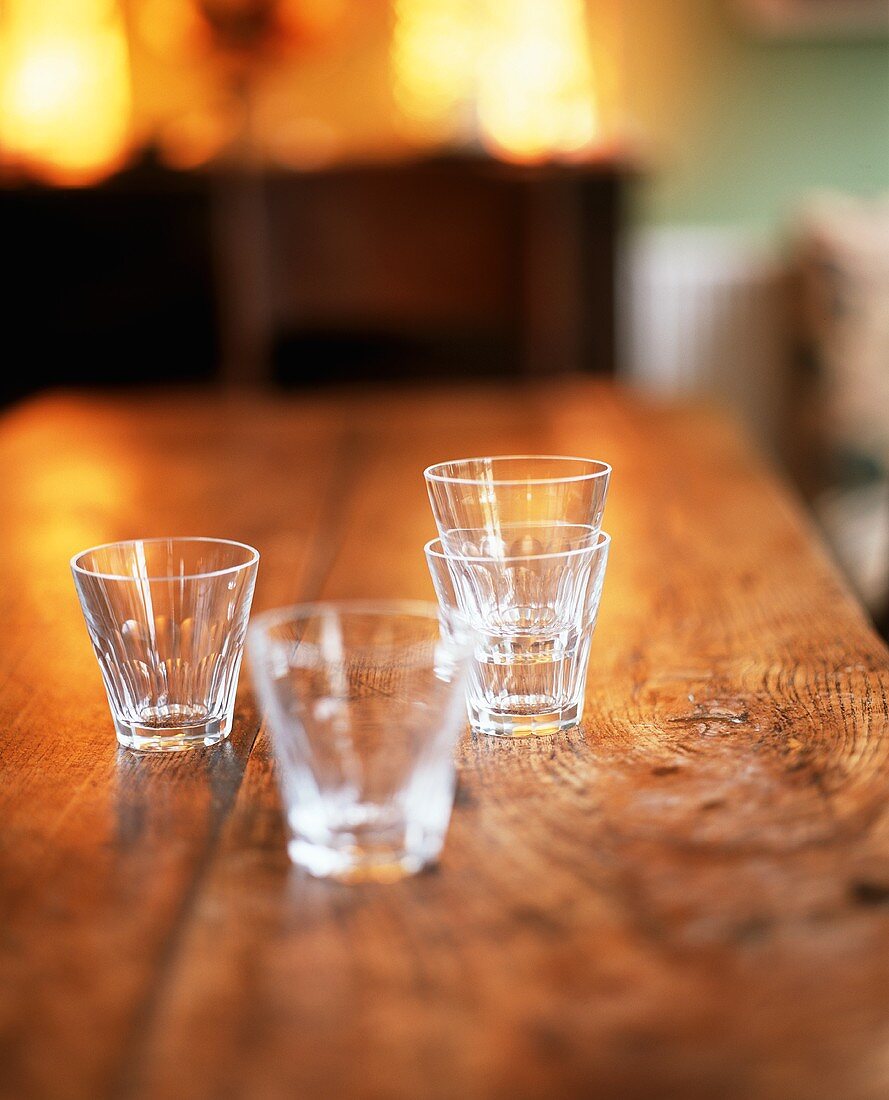 Glasses of water on a rustic wooden table