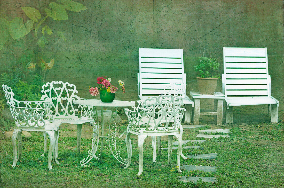 Chairs and table set in the garden. Sun loungers. Outdoor furniture., Taoyuan county, Taiwan, Asia.