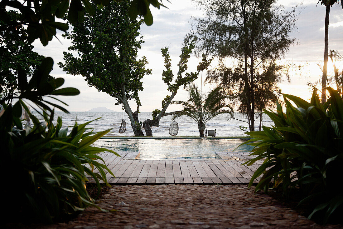 A view of the infinity pool and Gulf of Thailand at Knai Bang Chatt Hotel., Kep, Cambodia/Infinity Pool Resort