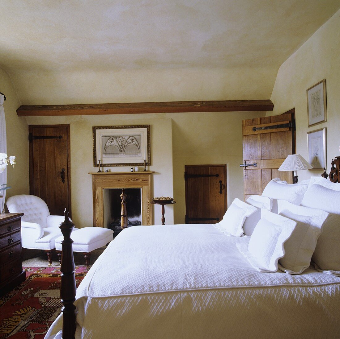 A double bed with white cushions in a country-style bedroom