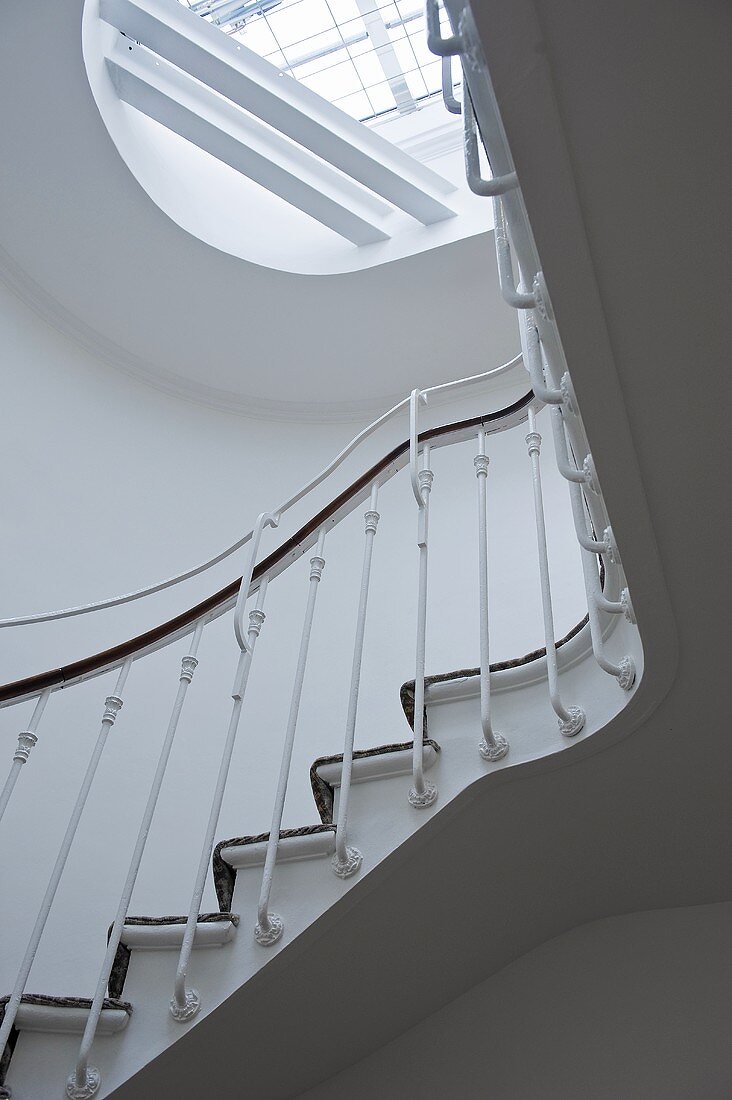 A stairway in a period building - a view of the skylight