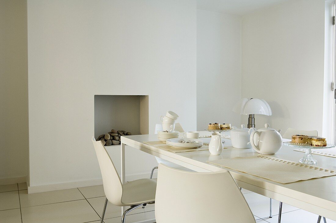 Breakfast in a white dining room - minimalistic design