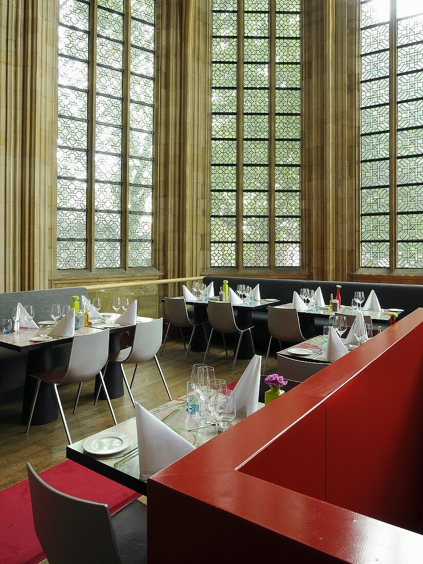 A designer restaurant in a converted church with Gotic windows