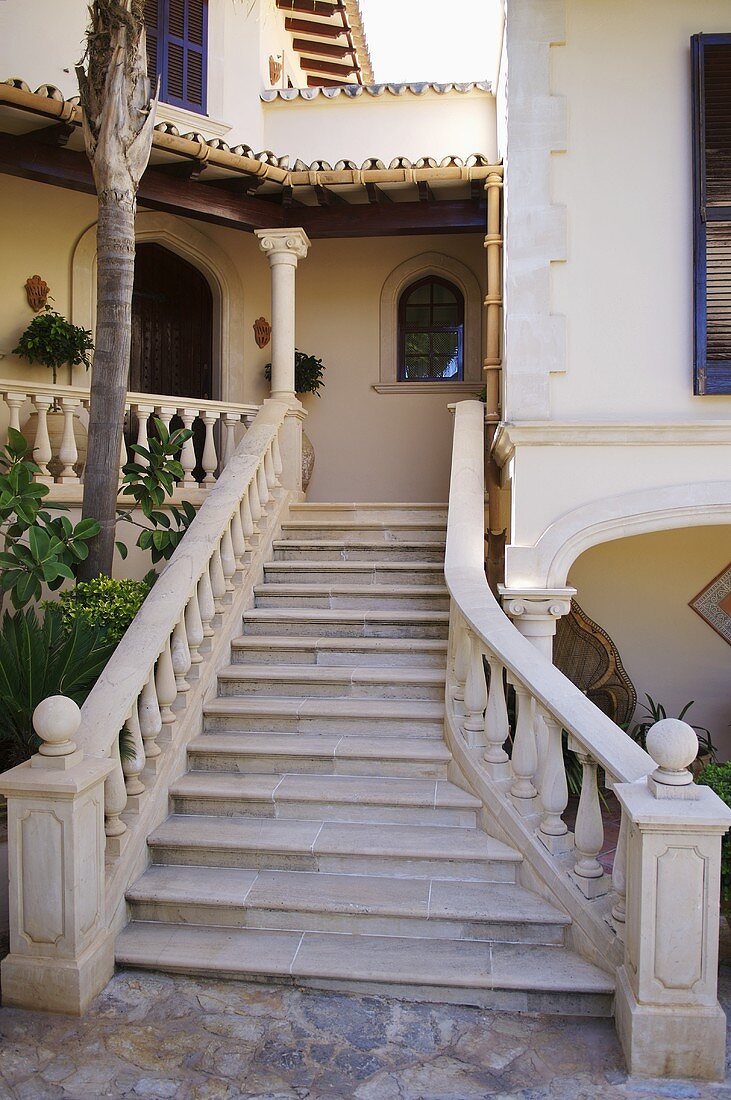 Stone staircase leading up to house