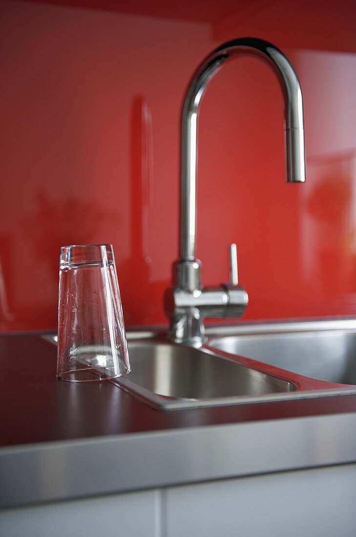 Stainless steel kitchen sink and chrome tap fitting