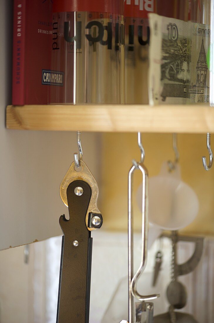 Kitchen utensils hanging from hooks