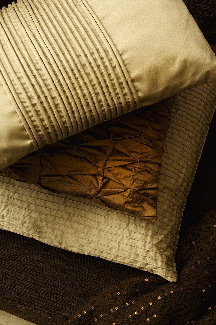Cushions in covered in elegant shiny fabric