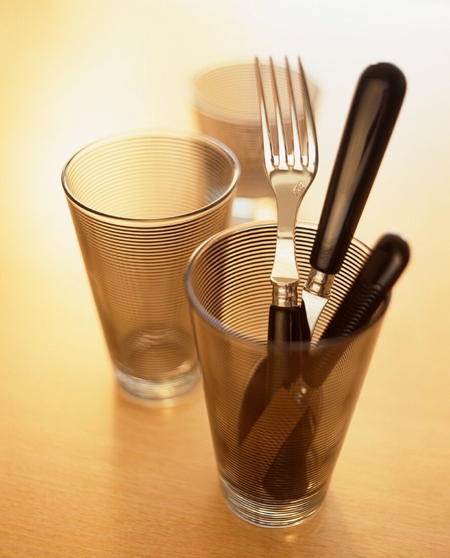 Cutlery in a drinking glass