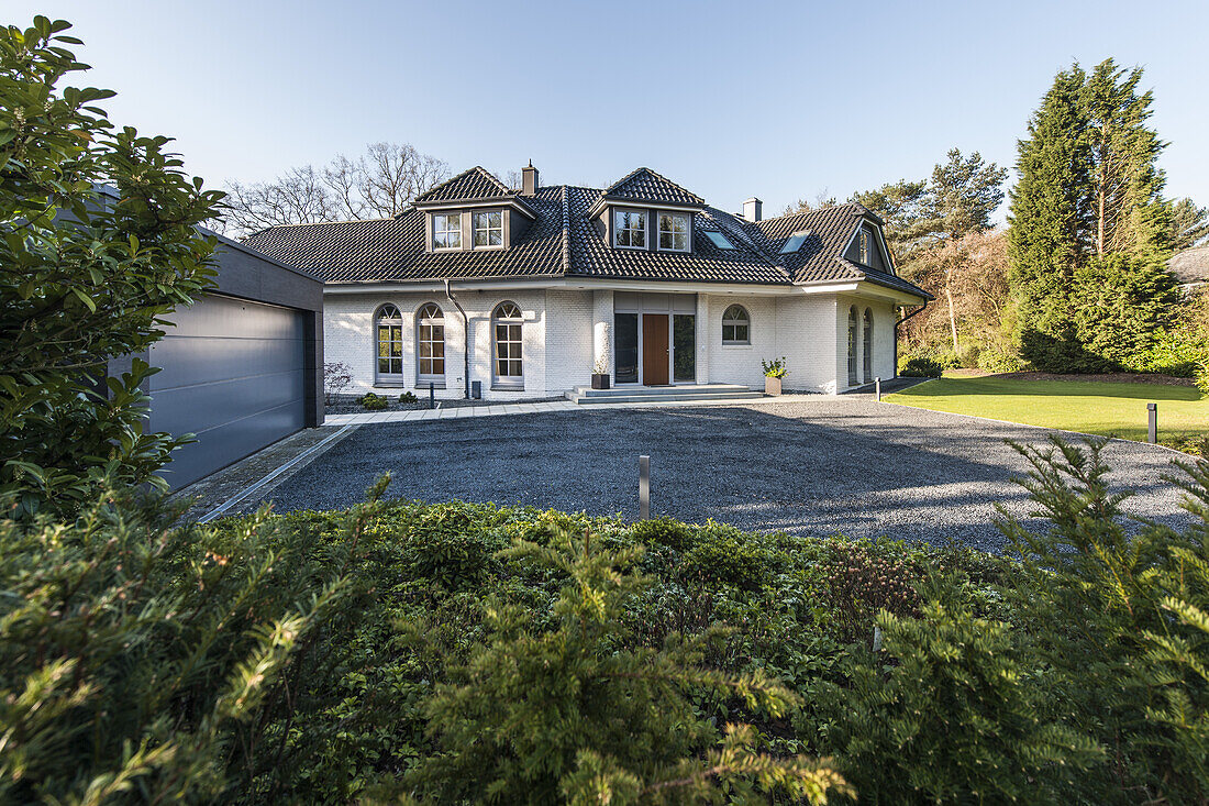 front area with garage of a modern one family villa in Hamburg, north Germany, Germany