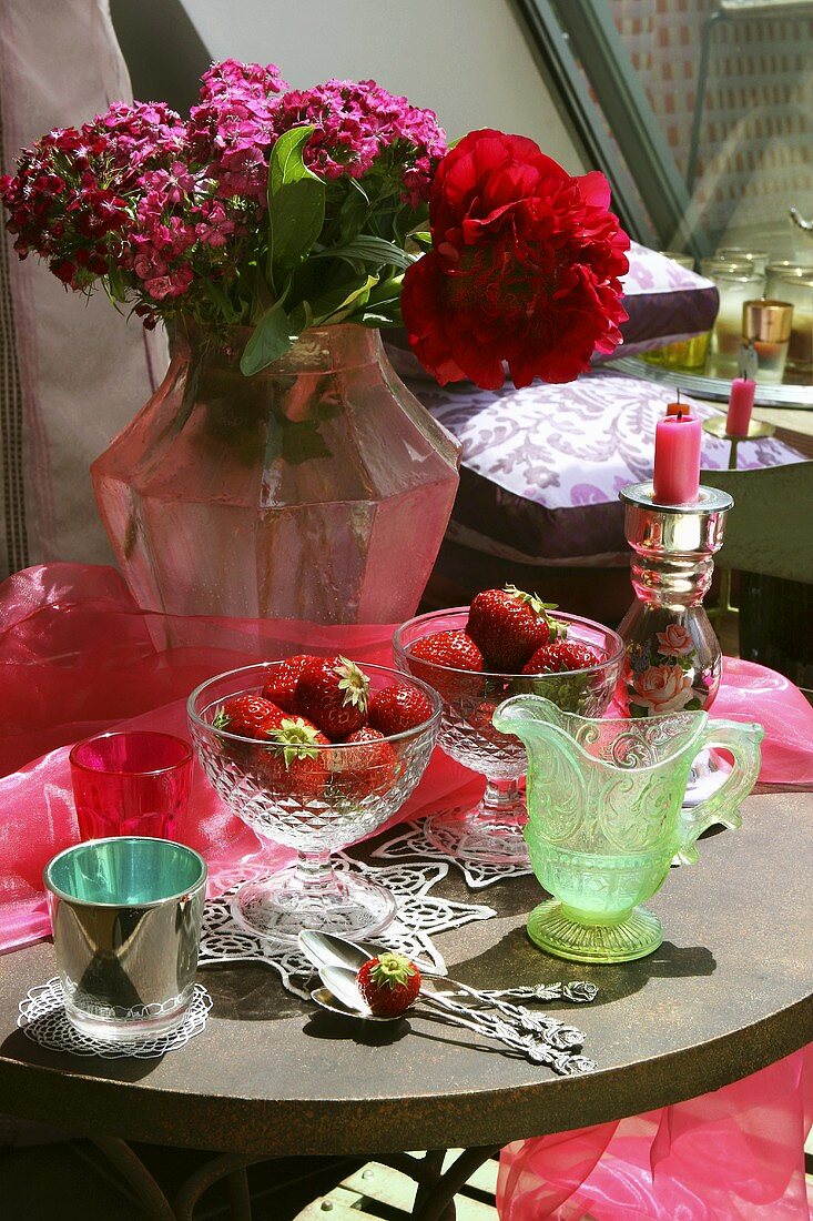 Laid table with fresh strawberries