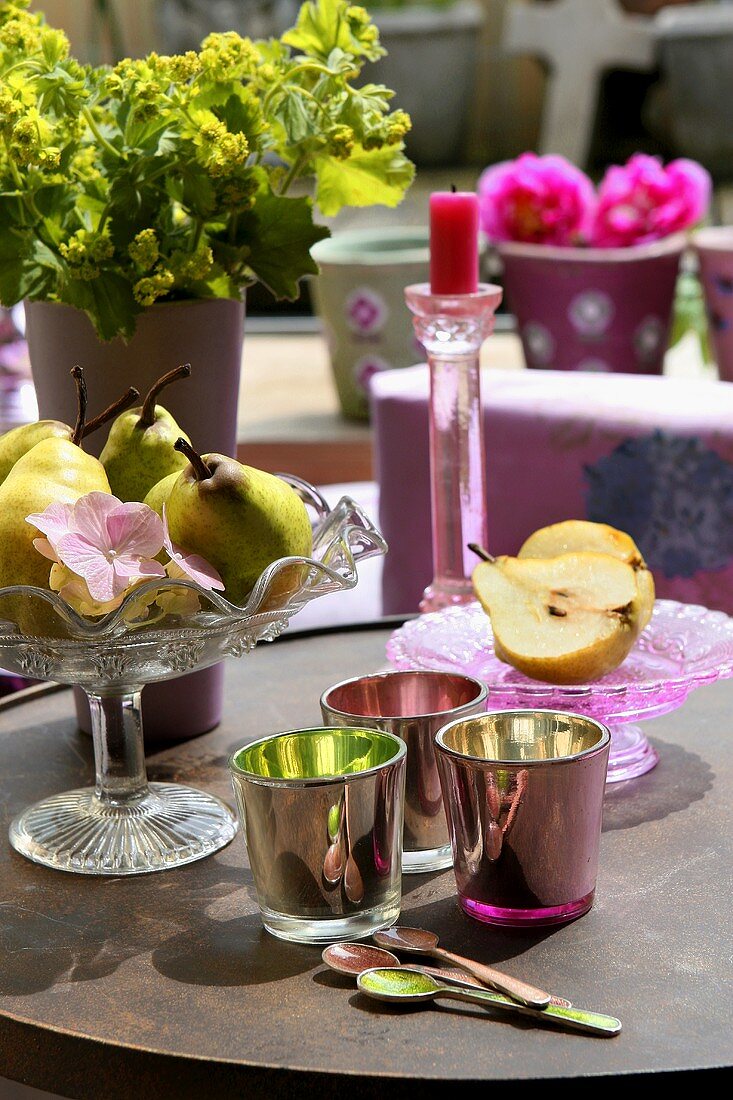 Table with pedestal dish and pears