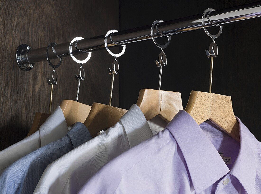 Shirts hanging in a wardrobe