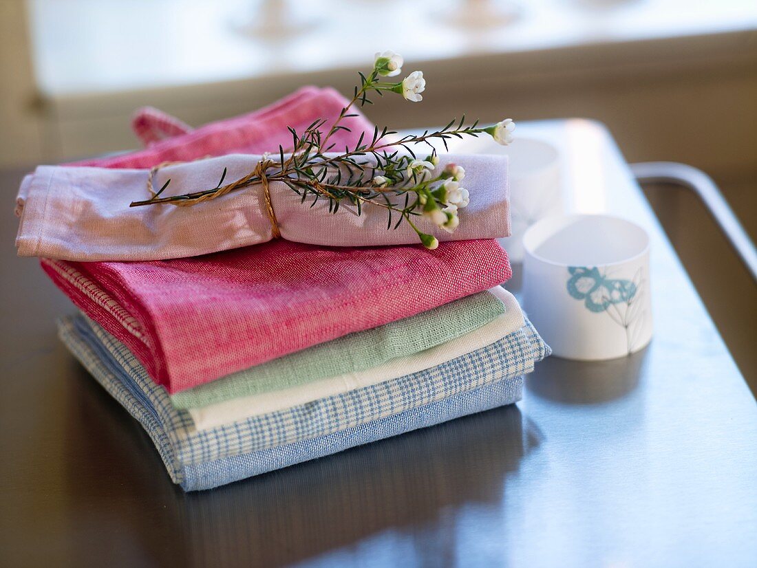 Linen cloths with flowering branch on top