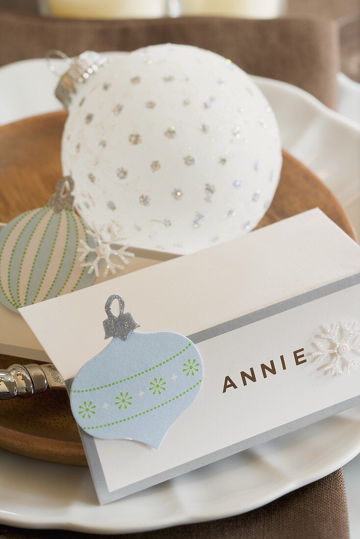 Christmas place-setting with place card and bauble