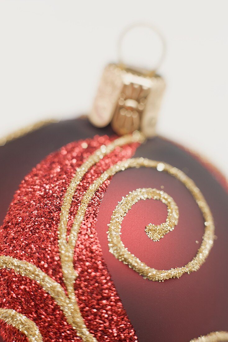 Red Christmas bauble with gold design (detail)