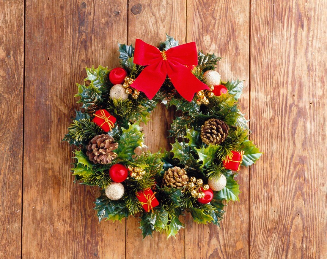 Festive door wreath with red bow