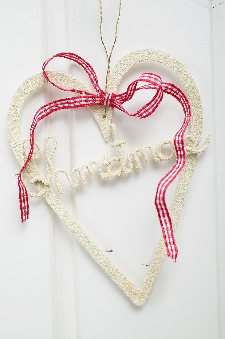 Christmas decoration: heart with checked bow