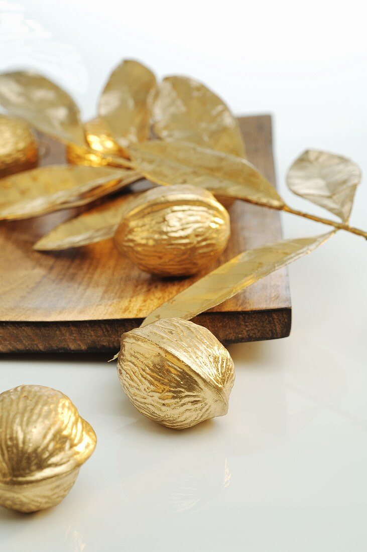 Christmas decorations: gold nuts and leaves