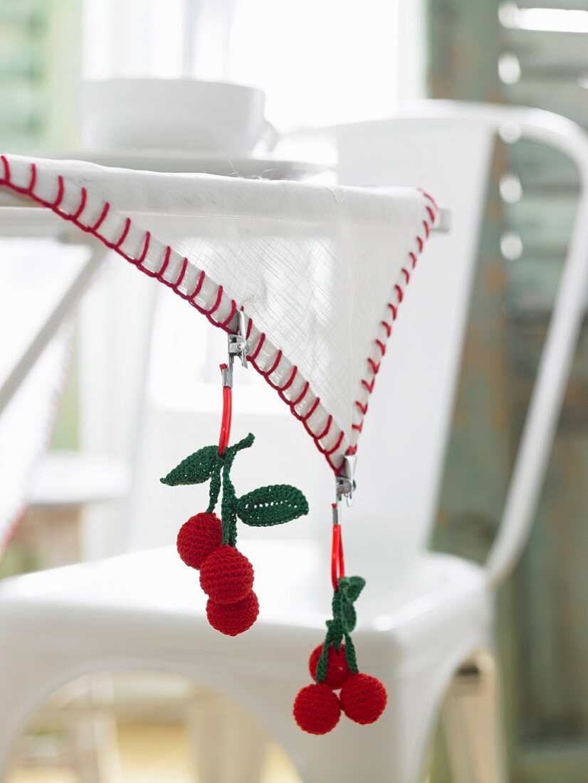 Crocheted cherry tablecloth clips