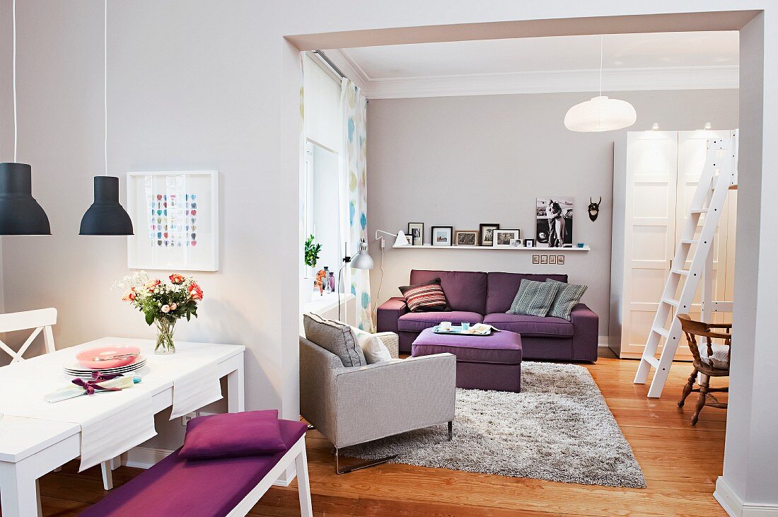 Interior in shades of lilac with dining area & lounge
