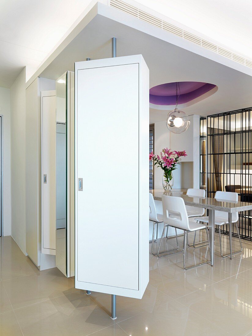 Modern interior with rotating cabinets